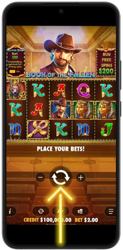 Golden circular spin button glowing on dark tomb background with hieroglyphics